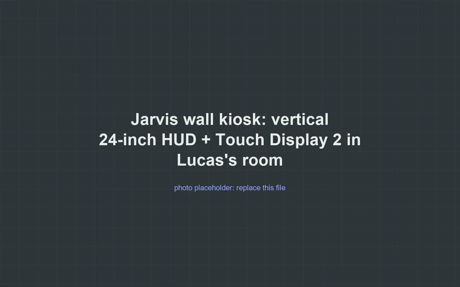 Placeholder for a photo of the Jarvis wall setup, a vertical 24-inch monitor showing the HUD with a small touchscreen beside it.